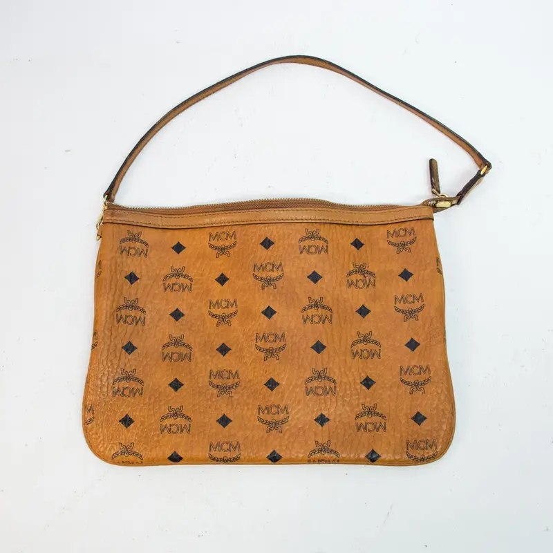 Mcm Visetos Cognac Leather Pouch – Signature Logo Embossed Travel Accessory 1